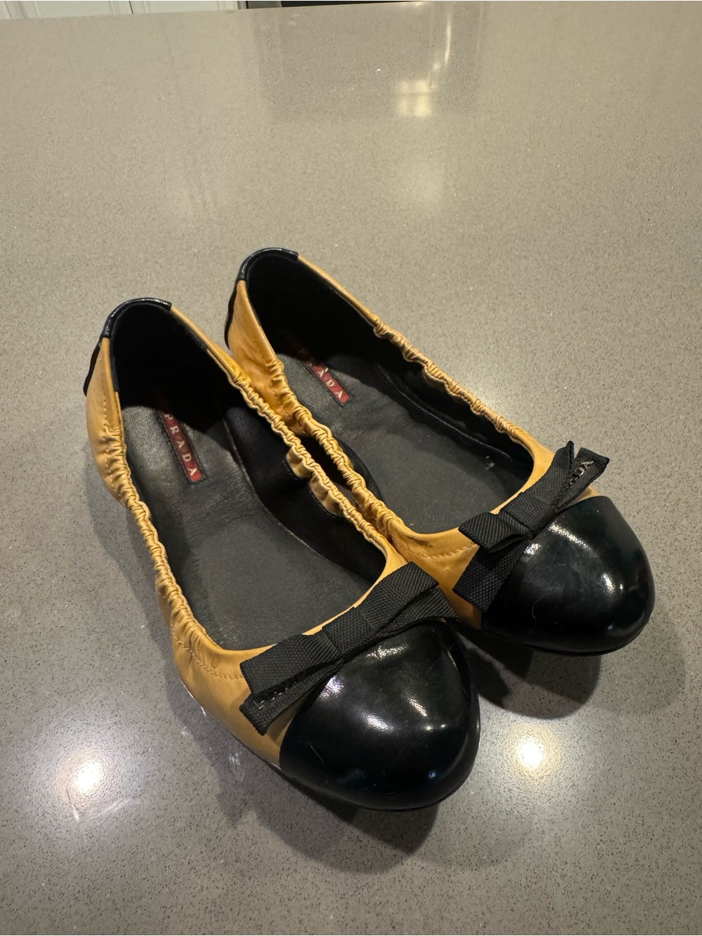 Prada Two Toned Black and Tan Patent Leather Flats